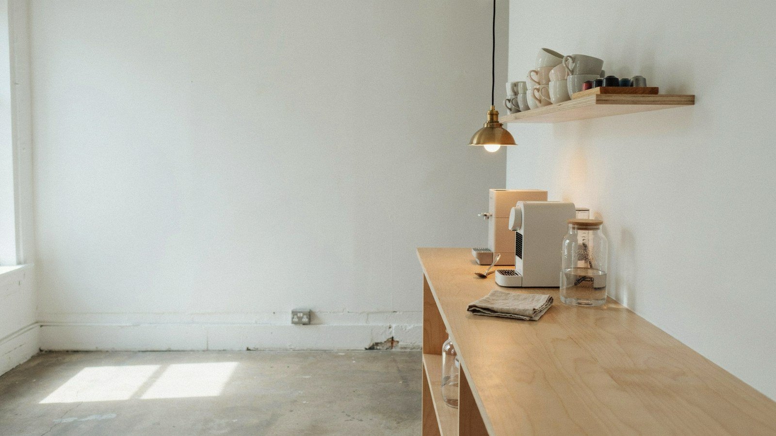 Welcoming coffee station set up in the corner of a bright creative studio